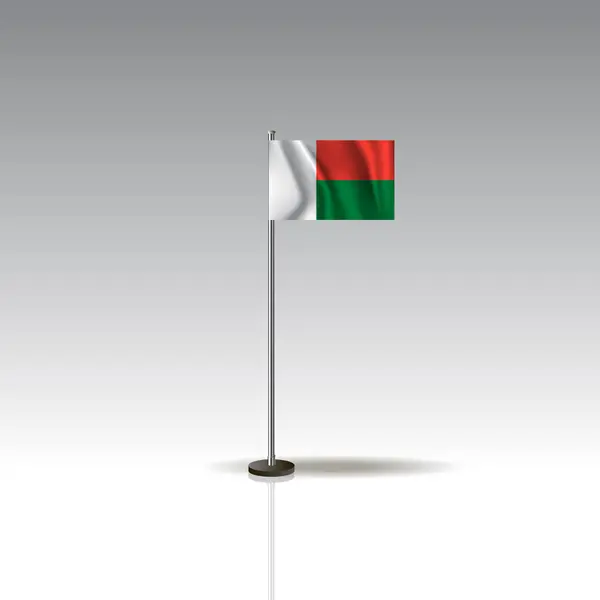 Flaggenillustration des Landes Madagaskar. Nationalflagge Madagaskar isoliert auf grauem Hintergrund. eps10 — Stockvektor