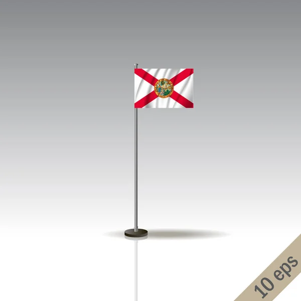 Plantilla de bandera vectorial Florida. ondeando la bandera de Florida en un poste metálico, aislado sobre un fondo gris . — Vector de stock