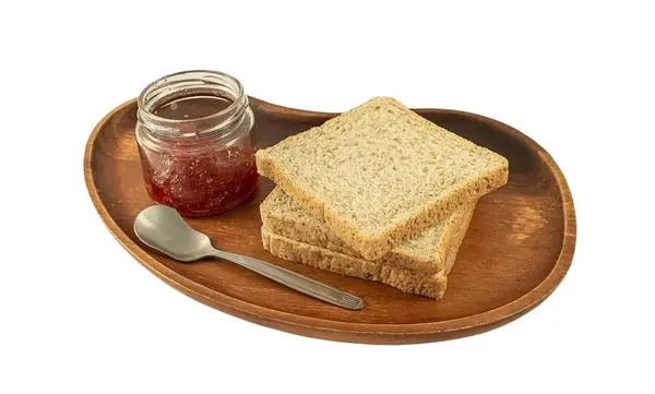 Whole wheat bread and strawberry jam — Stock Photo, Image