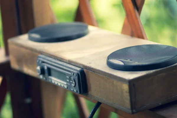 Old vintage retro tape recorder in a wooden case made with your own hands