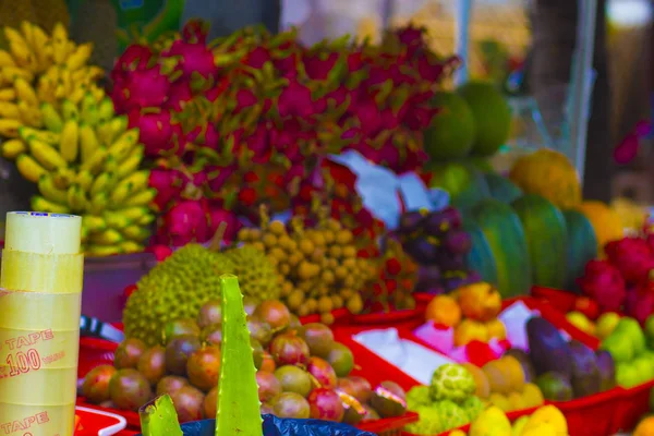 Tropical exotic fruits on the counter in the Asian market