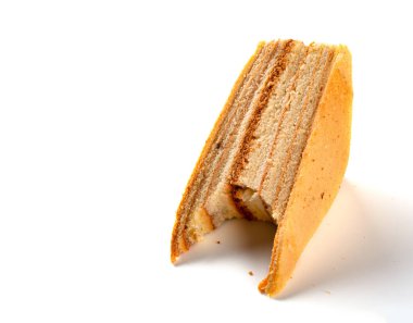 Ev yapımı sandviç şekil sünger kafesi altındaki beyaz bir ısırık ile
