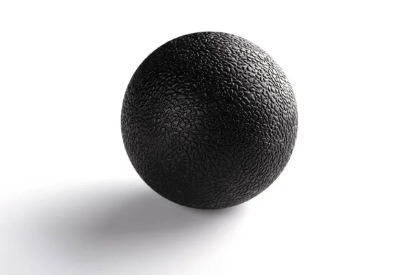 白い背景の黒いマッサージ ボール — ストック写真
