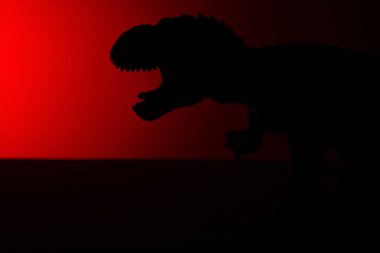 Tyrannosaurus gölge koyu kırmızı ışık ile