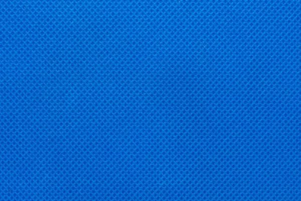 surface of blue non-woven fabric as background and texture