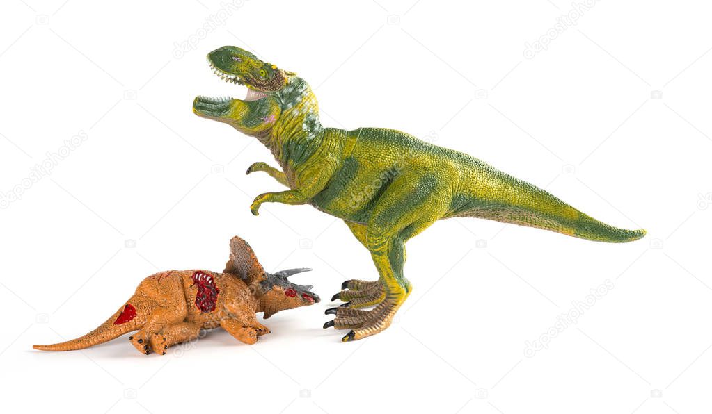 tyrannosaurus with a triceratops body nearby on white background