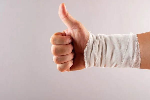 Postive Gesture Thumbs Wrapped Hand — Stock Photo, Image