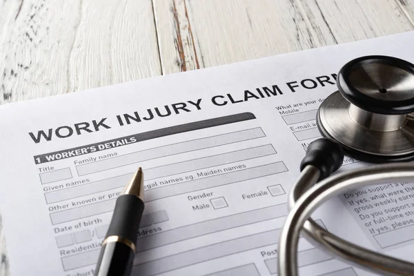 Side View Work Injury Claim Form Stethoscope Medical Insurance Concept — Stock Photo, Image