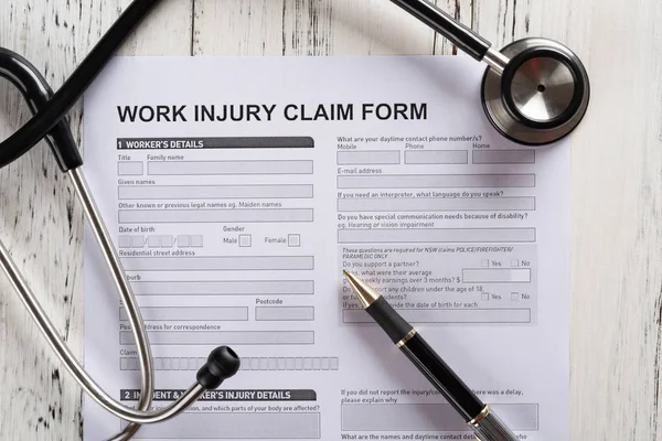 Top View Work Injury Claim Form Stethoscope Medical Insurance Concept — Stock Photo, Image