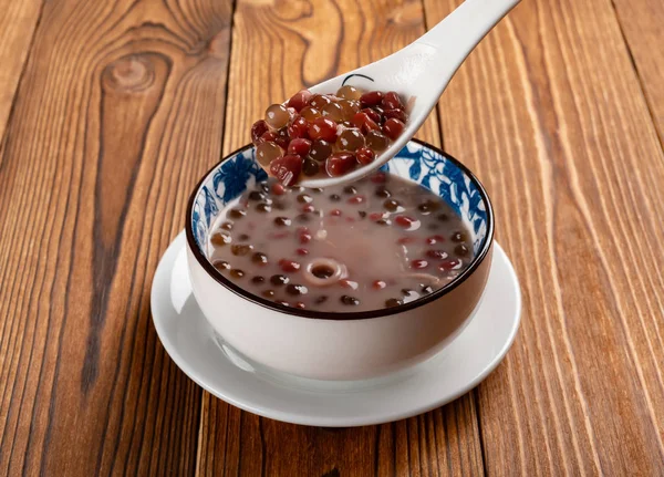 Chinese syrup of red bean and sago with shredded coconut