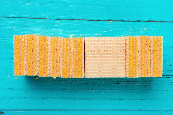 top view cheese wafer blocks on blue background