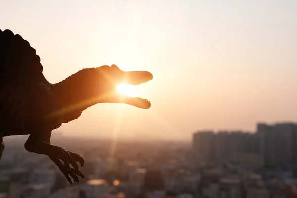 Silhouette Spinosaurus Buildings Sunset Time — Stock Photo, Image