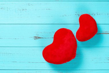 hearts on wood background with copy space concept of mothers day or valentines day