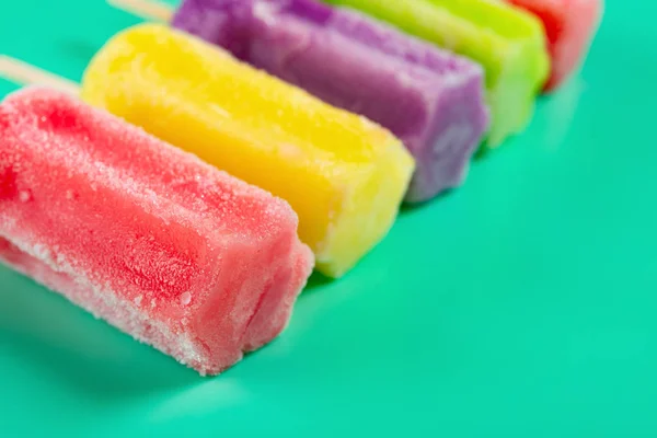 Multi Color Popsicles Line Green Background Copy Space — Stock Photo, Image
