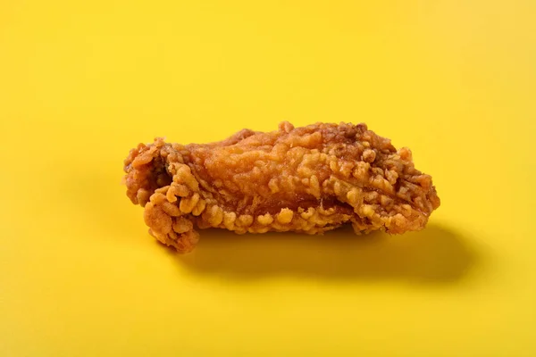 Side View Fresh Deep Fried Chicken Wing Yellow Background — Stock Photo, Image