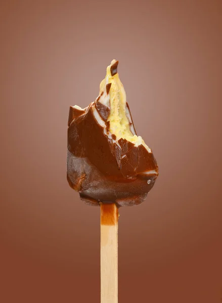 Mostly Eaten Chocolate Outer Popsicle Brown Background — Stock Photo, Image