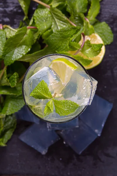 Mojito cocktail with lime and ice. Top view