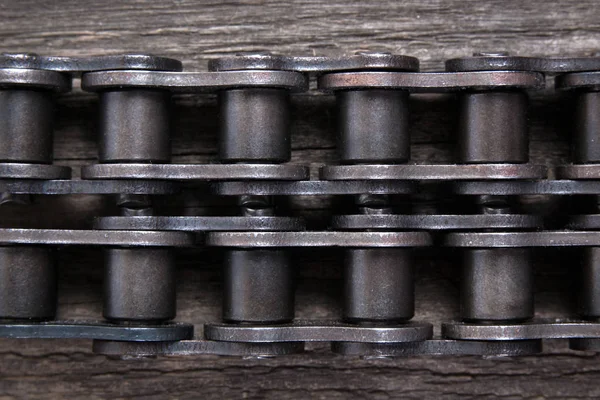 Industrial driving roller chain. Part of the chain drive of machine-building mechanism.