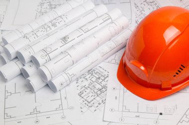 Kağıt mimari çizimler, blueprint ve kask. Blueprint mühendislik