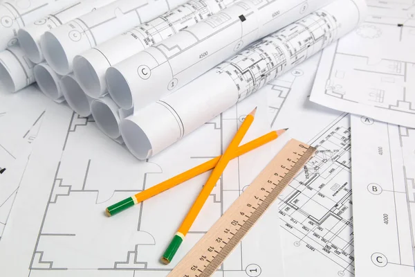 Paper architectural drawings, blueprint, pencil and ruler. Engineering blueprint — Stock Photo, Image