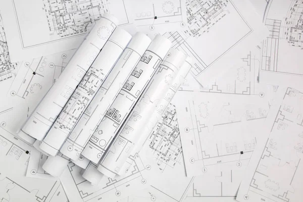 Dibujos arquitectónicos de papel y planos. Proyecto de ingeniería —  Fotos de Stock