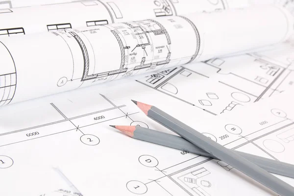 Lápices y dibujos y planos de casas de ingeniería de papel . —  Fotos de Stock