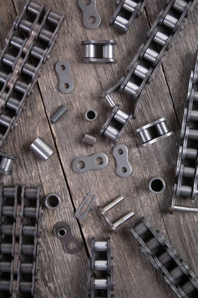 Industrial driving roller chain. Part of the chain drive of machine-building mechanism.