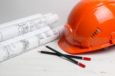 Mimari plan. Mühendislik evi çizimleri, kask, kalem ve planları.