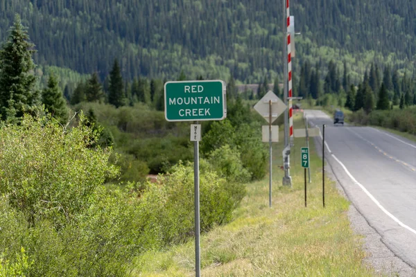 Sign for Red Mountain Creek in Colorado, a popular fishing destination in the San Juan Mountains near Ouray, CO