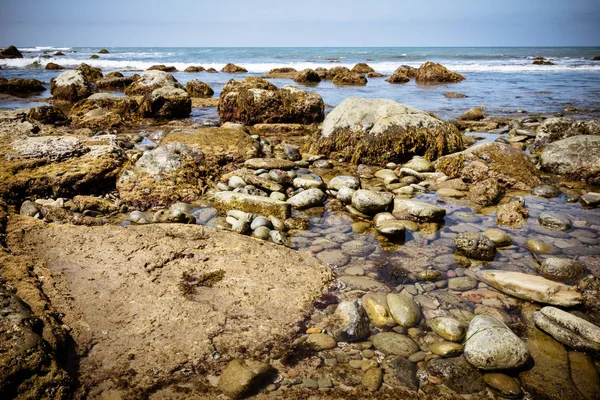 Tide pools on the Pacific Ocean during low tide at La Jolla shores near San Diego, California.