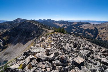 Rocky narrow  dangerous ridge of talus scree rocks on top of mountains in the Bridger Teton National Forest near Jackson Wyoming clipart