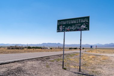 JULY 4 2018 - RACHEL, NEVADA: Landmark sign for the Extraterrestrial Highway is covered in stickers from tourists exploring this stretch of road known for Area 51 and UFO sightings clipart