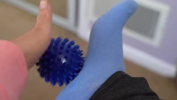 Woman Plantar Fasciitis Uses Spiky Ball Massage Her Aching Foot — Stock Video