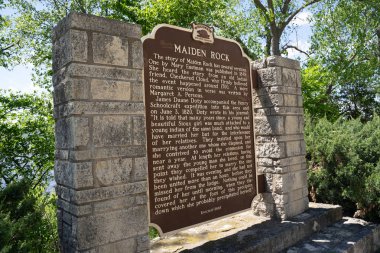 Maiden Rock, Wisconsin - May 25, 2019: Historical Marker gives i clipart