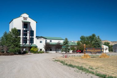 Kirby, Wyoming - June 23, 2020: Wyoming Whiskey, a small batch bourbon distillery, locally owned. Tours and a gift shop are available to customers clipart