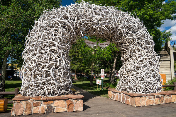 Jackson Hole, Wyoming - June 27, 2020: The elk antler arch welcoming visitors to Jackson Hole Wyoming is located in the town square