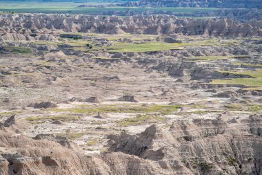Güney Dakota 'daki Badlands Ulusal Parkı' nın renkli aşınmış tepeleri.