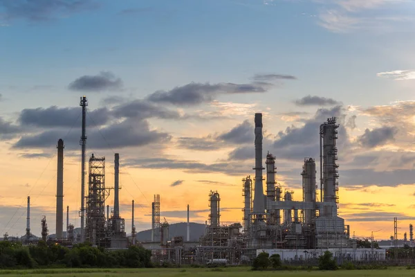 industrial factory buildings and sunset sky, chemical production industry