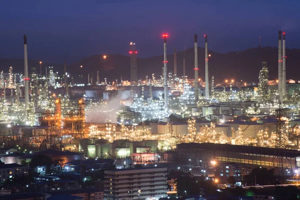 Oil refinery at twilight time, chemistry factory