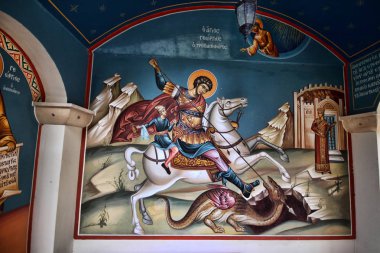The painting of St. George at the entrance to the monastery of Agios Georgios, Cyprus clipart