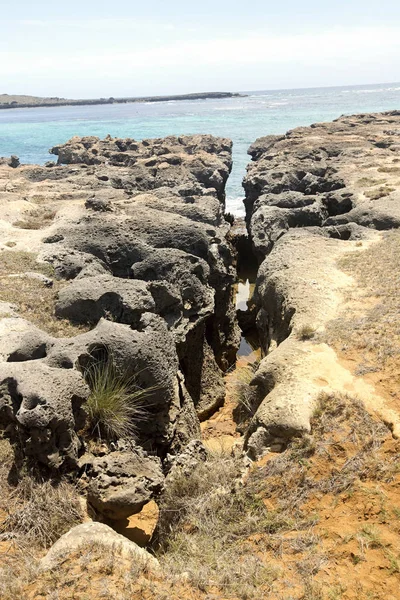 Bay Amoronia Indian Ocean, Orange cove is lined with sharp rocks, north of Madagascar