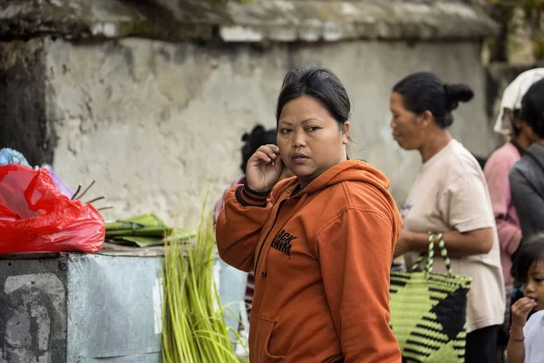 :saleswoman at the market, village Toyopakeh, Nusa Penida Indonesia