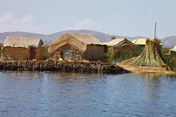 reed houses on floating island of floating reed,Lake Titicaca, Peru