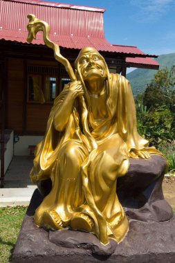 yaldızlı heykel, karmaşık Ban Hin Kiong Tapınak, Kuzey Sulawesi, Endonezya 