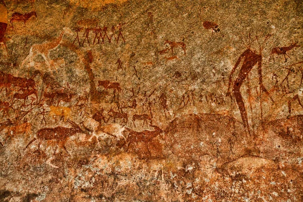 Bushmen rock painting of human figures and antelopes, giraffe of the Matopos National Park, Zimbabwe