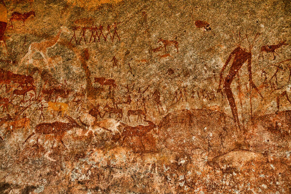 Bushmen rock painting of human figures and antelopes, giraffe of the Matopos National Park, Zimbabwe