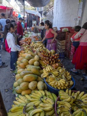CHICHICASTENANGO, GUATEMALA  FEBRUARY 3 2019:  Women at the market in Chichi Tenango, Guatemala, february 3 2019 Chichicastenango, Guatemala clipart