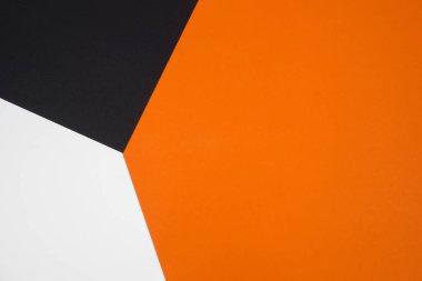 Siyah, turuncu ve beyaz kağıt geometrik düz yatıyordu arka planını renklendirin