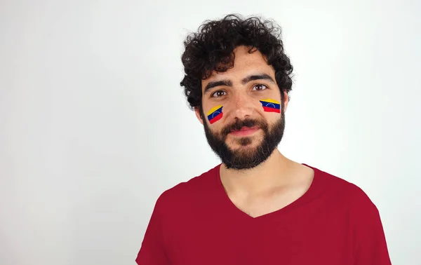 카메라를 스포츠 얼굴에 베네수엘라 메이크업의 국기와 티셔츠를 — 스톡 사진