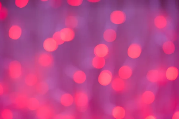 Új év világos lila háttér-val rózsaszín bokeh. — Stock Fotó